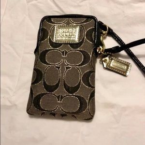 Authentic Coach wristlet.